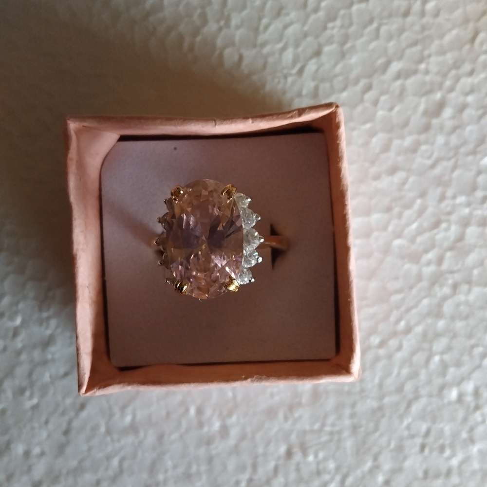 Pink Oval cz ring w clear cz's. 10k over silver